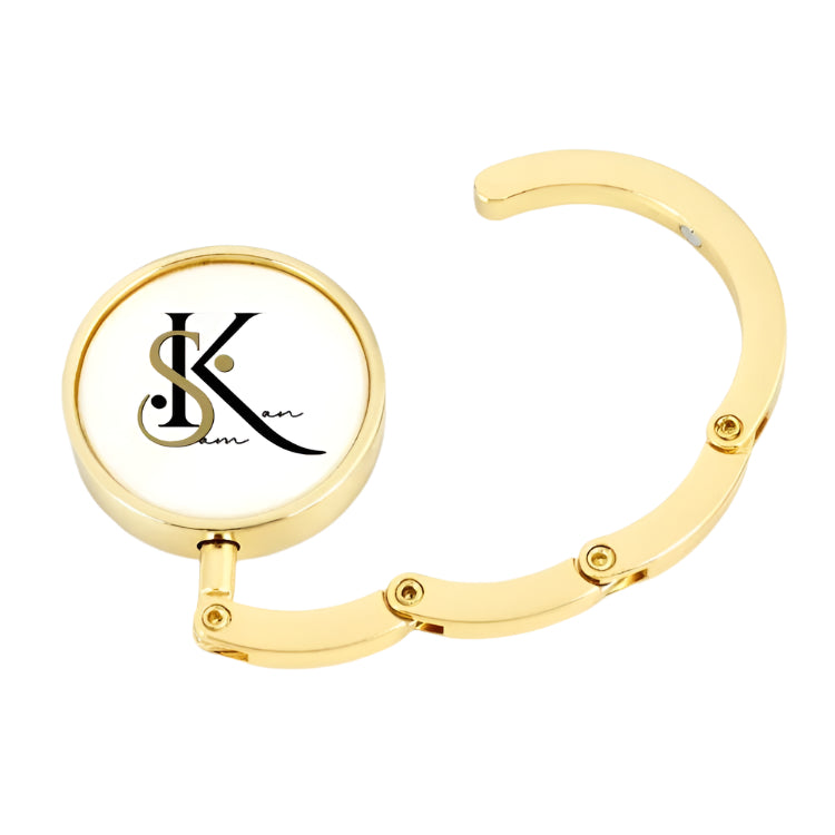 SAMKAN Gold and Silver Tone Purse Hanger | Displaying the Elegant Gold and Black SamKan Logo