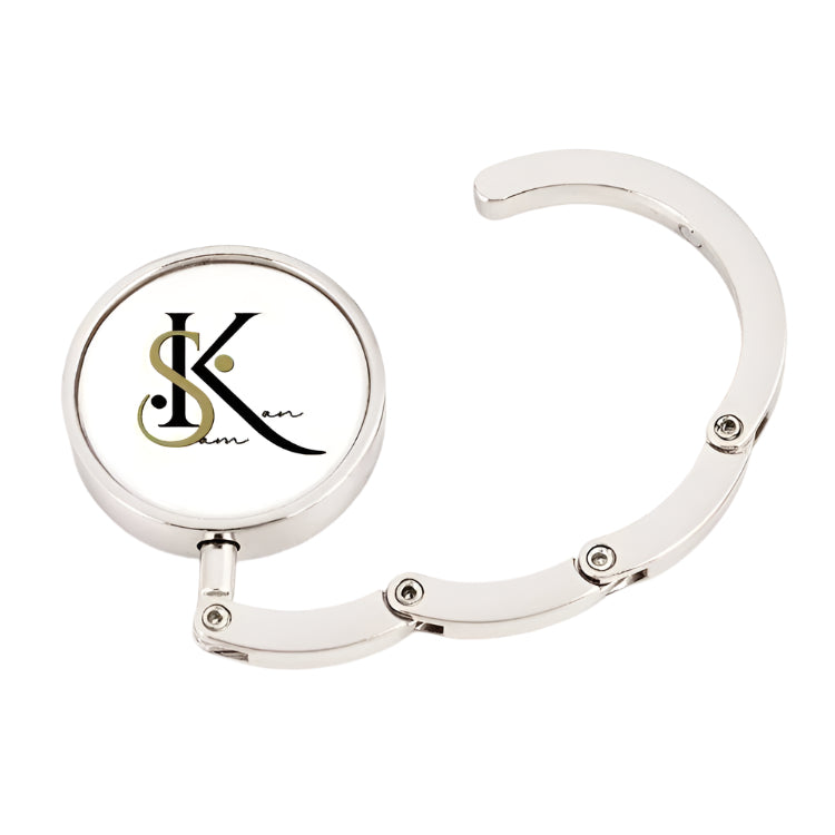 SAMKAN Gold and Silver Tone Purse Hanger | Displaying the Elegant Gold and Black SamKan Logo
